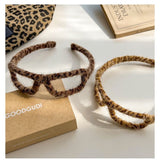 Temperamental plush leopard pattern glasses-shaped hair hoop