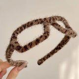 Temperamental plush leopard pattern glasses-shaped hair hoop